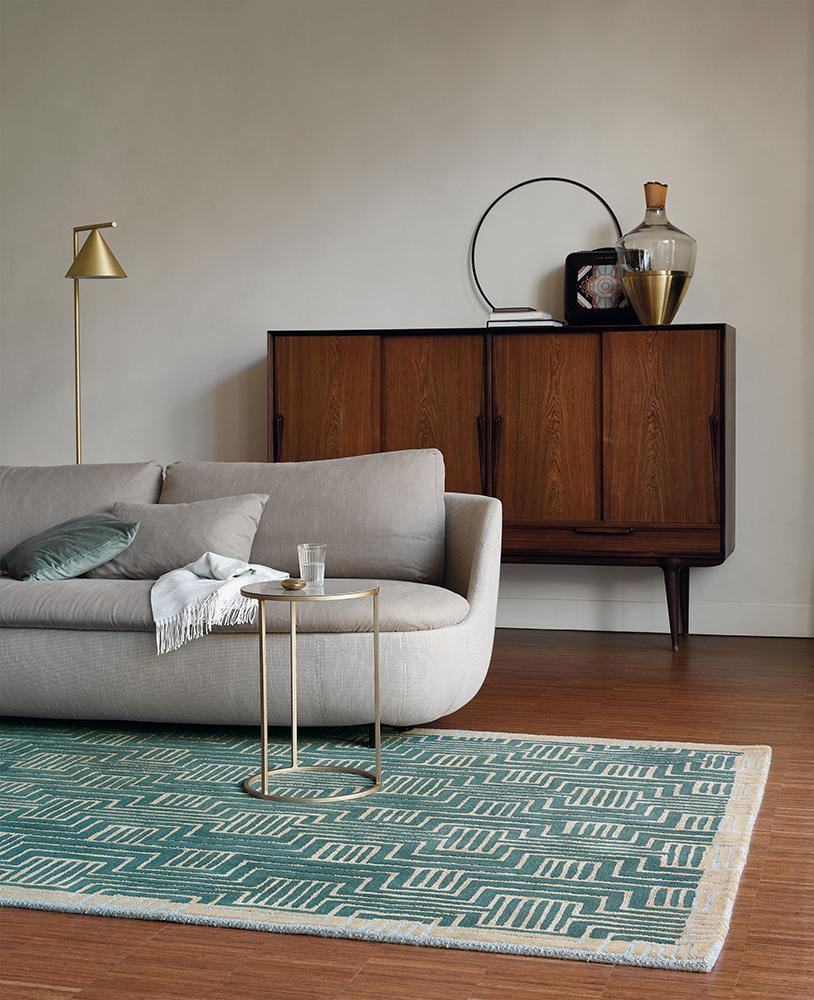 Ted Baker Kinmo green rug in a styled living room